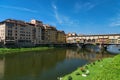 FLORENCE, ITALY Ã¢â¬â ÃÅÃÂY 25, 2017: River Arno and famous bridge Ponte Vecchio The Old Bridge at sunny summer day. Royalty Free Stock Photo